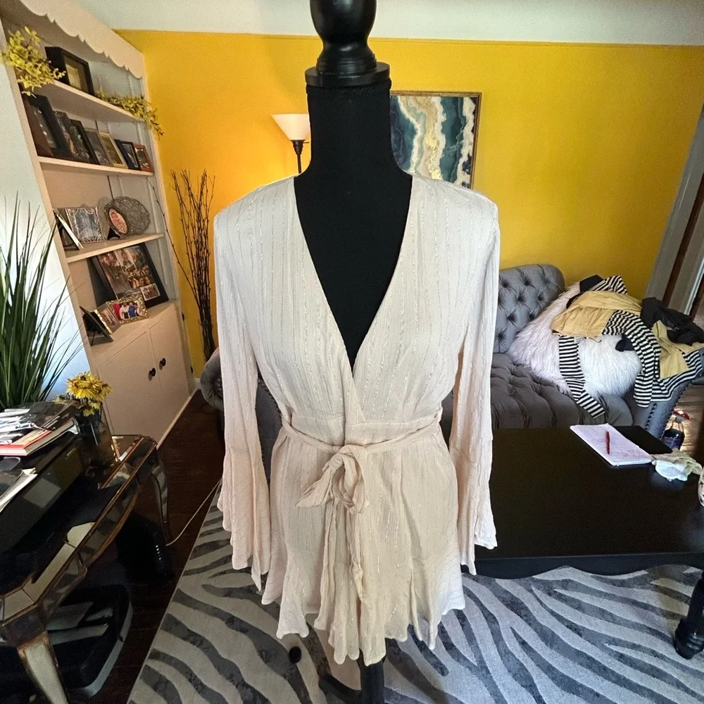 Fashion Nova cream with silver stripes short set zip up back. Plunging neckline.